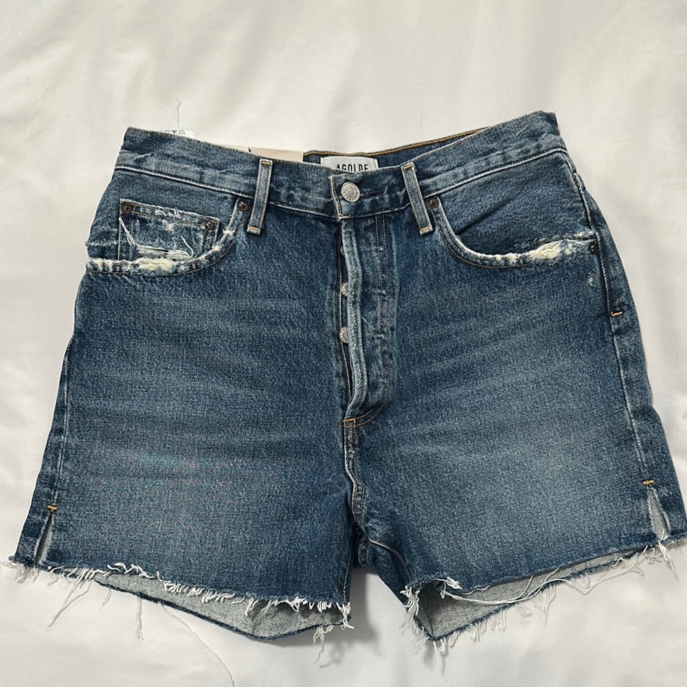 Agolde Blue Jean Shorts with Frayed Hem and Distressed Details
